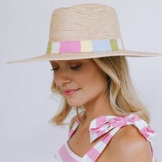 The Berta Palm hat features a cotton band with pastel stripes and is a part of our sustainable, fair trade hat collection and graded at the highest UPF rating. Due to the complexity of a hat made by hand, each hat slightly varies within a size. Help us hand select the right hat for you and include your head size in the order notes upon checkout. Details: Permanent woven band attached to crown of hat Hat Brim measures 3 3/4" wide Crown of hat measures 4 1/2" tall