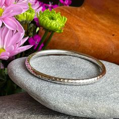 Like New Silpada Hammered sterling silver bangle bracelet. Stamped with Silpada Arrow logo and 925. Interior 2.5" wide 20g / .7oz Excellent condition! B1482 Buy with confidence, as all jewelry items are securely packaged and shipped promptly upon payment. Shop now and enjoy free shipping and gift wrap! Please browse my shop for more unique finds: www.bonnierosejewelry.com Additional Information: > The majority of my vintage items are used and may show some wear. Please review all photos closely Hammered Sterling Silver Bangle Bracelet, Gift Polished Sterling Silver Bangle Bracelet, Classic Hammered Bracelets As Gift, Classic Hammered Bracelets For Gift, Classic Hammered Bracelets For Gifts, Silver Hammered Bangle Bracelet, Everyday Silver Jubilee Bracelet, Nickel-free Sterling Silver Bangle For Anniversary, Hammered Sterling Silver Bangle Bracelet Gift