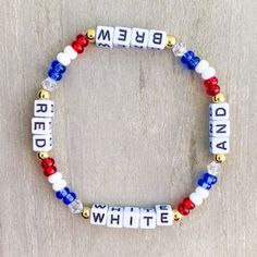 a beaded bracelet with red, white and blue beads