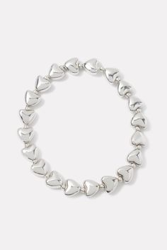 Give your look a little love with this chic EVEREVE bracelet, featuring silver-tone heart beads and stretch elastic for easy on-and-off. Wear it alone, or add it to a layered look with a chain bracelet. Cheap Round Bracelets With Heart Beads, Silver Stretch Bracelet With Heart Beads, Silver Stretch Bracelet With Heart Beads For Valentine's Day, Adjustable Silver Stretch Bracelet With Heart Beads, Silver Heart Charm Stretch Bracelet, Silver Stretch Bracelet With Heart Charm, Silver Stretch Bracelet For Valentine's Day, Trendy Silver Heart Beads Bracelet, Silver Heart Bracelet