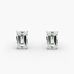 18K White Gold Emerald Cut Diamond Stud Earrings (Mounting). This pair of classic, emerald shape diamond earrings feature a tapered basket that showcases the unique characteristics of the emerald shape diamonds of your choice. The bold flashes of light and a luminescent nature capture the eye with every move. Emerald Cut Diamond Earrings, Emerald Cut Earrings, Emerald Cut Diamond, Unique Characteristics, Diamond Stud Earrings, Diamond Stud, Emerald Cut Diamonds, Diamond Earrings Studs, Diamond Studs