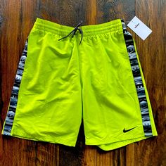 Selling A Pair Of New Nike Swim Men's Logo Tape Volley Shorts 9 Inch Nessc472-312 Atomic Green Various Sizes. Nike Short Swimwear For Sports, Nike Sports Swim Shorts, Nike Sports Swimwear Shorts, Nike Casual Sport Swimwear, Nike Swim Trunks For Spring Sports, Nike Casual Swimwear In Short Length, Nike Casual Swimwear With Built-in Shorts, Nike Casual Short Swimwear, Nike Casual Short Length Swimwear