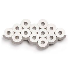 several rolls of toilet paper sitting on top of each other in front of a white background