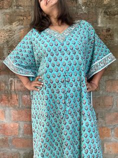 Kaftan, Cotton Caftan, Long Robe, Summer Dress, Long Maxi, Loungewear, beachwear, Maternity Dress, Holiday, Vacation Wear RARE, GENUINE AND UNIQUE PIECE FOR SURE!! The beauty of this kaftan is - -This lovely blockprint Indian kaftan is perfect for the poolside, beach or cruise holiday , anniversary gifts or as lounge wear. -It is teal with Paisley bordered blockprint dress. size- XS-S- 50 INCHES AROUND IN CIRCUMFERENCE M-L- 60 INCHES AROUND IN CIRCUMFERENCE XL-2XL-66 INCHES AROUND IN CIRCUMFERENCE 3XL-5XL - 74  INCHES AROUND IN CIRCUMFERENCE side slits 12 inches If you wish to customize it like longer side leg slits, front + back v neckline , or lengths please send me note while checking out..I will stitch at no extra cost!! Also for more confirmation please send me your HEIGHT/US size, wh Green Bohemian Kaftan With Short Sleeves, Traditional Green Kurta For Vacation, Traditional Green Tunic For Beach, Traditional Dress With Kimono Sleeves For Vacation, Traditional Green Dress With Kimono Sleeves, Traditional Tunic With Kimono Sleeves For Beach, Traditional Beach Dress With Kimono Sleeves, Traditional Green Tunic Style Maxi Dress, Traditional Green Free Size Maxi Dress