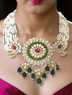 Pretty fine Pachi Kundan choker with Emerald/Ruby colored stones and Green Onyx beads and matching earrings Dimension: 9" end to end length, pendant size: 1.5" x 2.5" wide Earrings: 2.5" long Weight: 2.8 oz, w/ packaging: 3.6 oz Bollywood Beaded Choker For Diwali, Festive Beaded Choker For Diwali, Festive Beaded Kundan Choker Necklace, Festival Beaded Kundan Choker Necklace, Diwali Kundan Beaded Choker, Traditional Beaded Jewelry Sets For Reception, Traditional Bridal Necklace With Colorful Beads For Party, Traditional Party Choker With Round Beads, Bollywood Beaded Celebration Choker