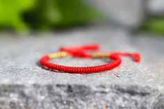 Multicolored bracelets with lucky Buddhist Tibetan knots, handcrafted according to Buddhist tradition Red symbolizes energy, action, confidence, courage, and change. Red brings passion and strength to your relationships, your life and your work. RED SPIRITUALLY EFFECTS: stability, security, grounding, courage, action, physical and emotional survival. ✿ History ✿ The Buddhist tradition of these very special bracelets has its origin in Buddhist temples, where Tibetan monks perform each knot while Handmade Braided Bracelets For Good Luck, Minimalist Braided Bracelet For Gift, Minimalist Braided Bracelet Gift, Spiritual Gift Braided Mala Beads Bracelet, Knots Bracelet, Tibetan Monk, Buddhist Bracelet, Braided Rope Bracelet, Buddhist Temples