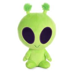 a green alien stuffed animal with purple eyes