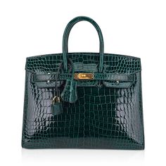 Hermes Birkin Sellier 25 bag featured in Vert Fonce Porosus Crocodile. Stunning with jewel toned Emerald green.This rich dark green is highlighted with the lighter hue between the scales with stunning effect.Neutral and great for year round wear.Crisp with Palladium hardware.Comes with the lock, keys, clochette, signature Hermes box and sleepers. NEW or NEVER . final sale BAG MEASURES:LENGTH 25 cm / 9.75" TALL 18.5 cm / 7.25"DEEP 13 cm / 5.25" HANDLES:TALL 3" CONDITION:NEW or NEVER Will be deliv Hermes Birkin Sellier, Birkin Sellier, Hermes Birkin 25, Crocodile Bags, Hermes Box, Birkin 25, Hermes Birkin, Brunei, Emerald Green