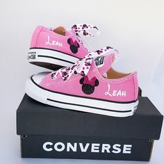 "These pink Converse shoes have Minnie and her name on both shoes. Minnie Mouse laces as well. Crystals on the toes if you so choose during check out. Some people feel that Converse run big. Please consult the following size measurements before ordering to make sure of the size you need. I don't accept returns for the wrong size being ordered: Sizes from heel to toe on soles of shoes: 2 is 4 3/4\" 3 is 5 1/4\" 4 is 5 1/2\" 5 is 5 3/4\" 6 is 6 1/4\" 7 is 6 1/2\" 8 is 6 3/4\" 9 is 7\" 10 is 7 1/2\ Converse Run, Girls Shoes Sneakers, Pink Converse, Girls Sneakers, Converse Shoes, Black Glitter, Chuck Taylor Sneakers, Pink Bow, Converse Sneaker