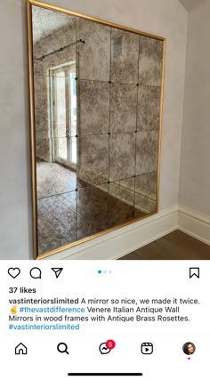 a mirror that is in the middle of a room with tile floors and walls on it