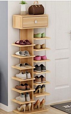 the shoe rack is made from wood and holds many pairs of shoes