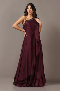 Wine one-shoulder drape style gown with delicate sequin embroidery crafted in diamond chiffon.
Components: 1
Pattern: Embroidered
Type Of Work: Sequin
Neckline: One-Shoulder
Sleeve Type: Asymmetric
Fabric: Diamond Chiffon
Color: Wine
Occasion: Party - Aza Fashions Pre-draped Georgette Evening Dress For Party, Draped Georgette Evening Gown, Evening Draped Georgette Gown, Floor-length One Shoulder Sequin Evening Dress, Sequined Gown With Asymmetrical Neckline, Embellished One-shoulder Dress For Prom With Asymmetrical Neckline, Evening Gown With Sequins And Asymmetrical Neckline, Embellished One-shoulder Dress With Asymmetrical Neckline For Prom, Embellished One Shoulder Dress With Asymmetrical Neckline For Prom