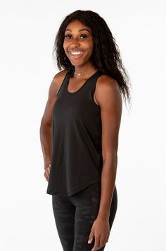 Designed with a Flattering open back detail that pairs Perfectly with all of our sports bras. We love it for running, weightlifting, yoga, and all cardio activities where staying cool is a must. The elevated neck-line was incorporated at the request of our fans. This is our loosest and most free fitting top yet! Cardio Activities, Back Details, Sports Bras, Weight Lifting, Cardio, Open Back, Love It, Sports Bra, Tank Top