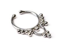 This is a beautiful fake septum ring for non pierced septums made of Sterling Silver 925. All Jewellery is packaged in a wonderful Gecko Spiritus gift box and a handmade gift bag. No need to wrap and ideal for gifts.Diameter of Septum ring : 9mm Drop of septum ring : 17mmWidth : 13mm * Now also available in Gold Plated over Sterling Silver, 3 microns plating the highest gold plating possible. Any Items ordered will be posted out most mondays, tuesdays and fridays ( With the exception of UK natio Septum Gold, Fake Septum Ring, Indian Nose Ring, Brass Hoop Earrings, Hamsa Necklace, Nose Ring Stud, Silver 925 Necklace, Pretty Earrings, Body Jewellery