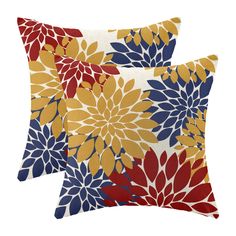 two pillows with colorful flowers on them