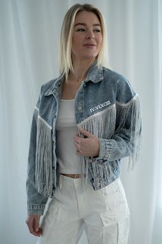 Our fringe detail denim jackets can be customized with your text to make for a one of a kind special item. Be the life of the party with the fun fringe details on these jackets with a lightweight fit and signature cotton denim feel. We suggest sizing up as these run on the smaller side. This item ships in 10-14 days. Product Care💓 Please hand wash with care. Do not iron directly on personalization. Spring Bohemian Denim Jacket With Frayed Hem, Bohemian Denim Jacket With Frayed Hem, Festival Denim Jacket With Fringe And Long Sleeves, Festival Denim Fringe Outerwear, Festival Long Sleeve Outerwear With Frayed Hem, Fringe Denim Jacket For Fall Festival, Fall Festival Denim Jacket With Fringe, Spring Festival Denim Jacket With Fringe, Fall Festival Fringe Denim Jacket