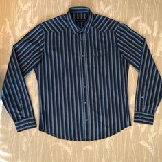 . 100% Cotton . Made In Italy . Size Medium . Tapered Body . Pleated Chest Pocket W/ Buttoned Flap Closure . Mother Of Pearl Buttons W/ Burberry Logo . Western Chest And Shoulder Yoke . Sleeve Placket W/ Logo Button Closure . Barrel Cuff W/ Burberry Logo Button . Stripes Matched Throughout . Excellent Condition Casual Slim Fit Blouse For Business Casual, Spread Collar Cotton Tops For Office, Casual Slim Fit Blouse With Spread Collar, Cotton Office Wear Top With Spread Collar, Casual Spread Collar Blouse For Office, Casual Office Blouse With Spread Collar, Casual Office Wear Blouse With Spread Collar, Casual Blouse With Spread Collar For Office Wear, Casual Striped Slim Fit Shirt