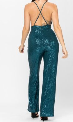 All over sequin, sleeveless, bodycon jumpsuit with a v-neckline, spaghetti straps, and a wide leg 100% POLYESTER Bodycon Jumpsuit, Bell Bottoms, Bell Bottom Jeans, Spaghetti Strap, Sequin, Spaghetti, Wide Leg, Jumpsuit