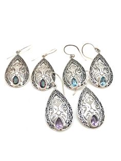 "Intricately detailed sterling silver Bali teardrop earrings with a pear-shaped semi-precious stone at the bottom measures 1 3/4\" in length from the top of the ear wire and 5/8\" in width at its widest point. The pear-shaped stone measures 1/8\" in width and 3/16\" in length. Earrings are rhodium plated over sterling silver so as to prevent tarnishing." Pear Shaped Pendant, Bali Earrings, Filigree Earrings, Citrine Stone, Mystic Topaz, Small Rings, Ear Wire, Teardrop Earrings, Pear Shaped