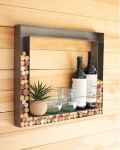 a wine rack with bottles and glasses on it