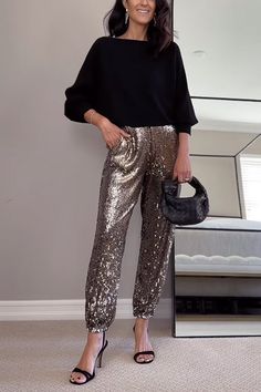 Show off your style in these sparkling Glam High Rise Sequin Joggers. With a contemporary design made of shimmering sequin fabric, these joggers offer perfect comfort and shimmering flair. Make a statement and add glam to your wardrobe. Material:Cotton+Polyester+Sequin SIZE US/CAN BUST WAIST HIPS S 2-4 33"-34" 26"-27" 36"-37" M 6-8 35"-36" 28"-29" 38"-39" L 10-12 37"-39" 30"-32" 40"-42" XL 12-14 40"-42" 33"-35" 43"-45" Sequin Joggers, Sequin Fabric, Dresses For Sale, Contemporary Design, Sweaters & Cardigans, Jumpsuit Romper, High Rise, Rompers, Wardrobe