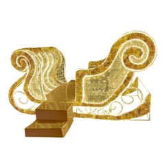 an artistic golden design with swirls on it