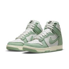 Celebrate heritage with an updated version of the Dunk High, recrafted to reflect the original from 1985. Matching the shape, look and feel that started it all, it delivers true vintage style while keeping the familiar comfort you love.Upper ages to soft perfection and features a durable construction reminiscent of '80s b-ball.Padded, high-top collar brings you old-school appeal that's rooted in comfort.Rubber outsole with classic hoops pivot circle adds traction and heritage style. Style # DV11 Nike Dunk High 1985, Dunk High 1985, Nike High, Nike Models, Dunk High, Nike Dunk High, Air Jordan 3, Nike Air Max Plus, Heritage Fashion