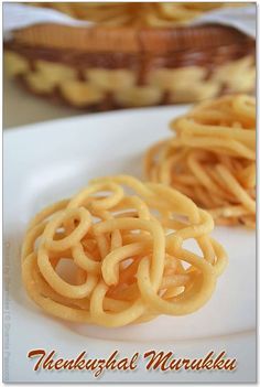 some food is on a white plate and there are other foods in the basket behind it