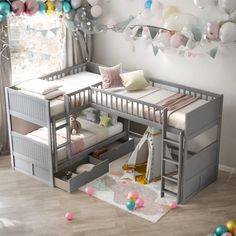 a child's bedroom with two bunk beds and a loft bed in the middle