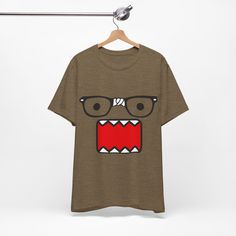 Unisex Domo Kun Tshirt - Emo Scene y2k Fashion Tshirt - 2000's Vintage Cartoon Hot Topic This classic unisex jersey short sleeve tee fits like a well-loved favorite. Soft cotton and quality print make users fall in love with it over and over again. These t-shirts have-ribbed knit collars to bolster shaping. The shoulders are tapered for a better fit over time. Dual side seams hold the garment's shape for longer.  .: Made with 100% Airlume combed and ring-spun cotton, a lightweight fabric (4.2 oz Casual Short Sleeve Fan Merchandise T-shirt, 90s Style Logo Print Tops For Fans, Fan Apparel Tops With Graphic Design And Relaxed Fit, Fan Apparel Short Sleeve Cotton Shirt, Fan Apparel Cotton Short Sleeve Shirt, Fan Apparel Top With Graphic Design And Relaxed Fit, Fan Apparel Cotton Shirt With Short Sleeves, Relaxed Fit Fan Apparel Top With Graphic Design, Relaxed Fit Graphic Top For Fan Apparel