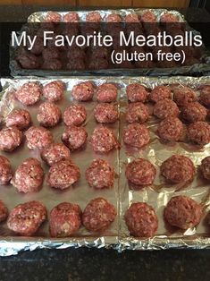 two trays filled with meatballs sitting on top of a counter next to each other