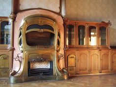 an old fashioned wooden stove in a room