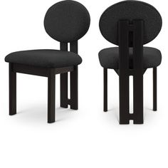 two black chairs sitting next to each other