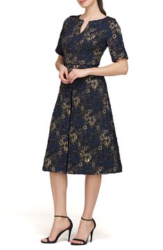 Enchant the crowd in this fit-and-flare cocktail dress cut from metallic jacquard with a graceful notched neck. 41" length Hidden back-zip closure V-neck Elbow-length sleeves Lined 100% polyester Dry clean Imported Navy Gold, Elbow Length Sleeve, Dress Cuts, Nordstrom Dresses, Fit And Flare, Top Brands, Cocktail Dress, Nordstrom, V Neck