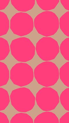 a pink and beige background with circles