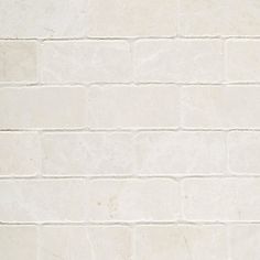 a white brick wall with no mortars on it