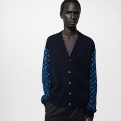 This luxurious cashmere-blend cardigan exudes off-duty elegance with its horn buttons, patch pockets and soft shoulders. An allover monogram jacquard on the sleeves in a bold contrasting blue adds a graphic twist to this versatile transeasonal piece which pairs effortlessly with formal and casual looks Louis Vuitton Cardigan, Louis Vuitton Official Website, Louis Vuitton Official, Cashmere Cardigan, Off Duty, Men's Collection, Latest Design, Louis Vuitton Monogram, Casual Looks