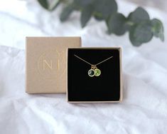 This gorgeous birthstone necklace makes a wonderful and long-lasting gift for someone special.D E T A I L S- available in 925 sterling silver or 24k gold plated- eco-friendly jewelry box with foiled pressed NJ Studio logo- no receipt included - gift-giving ready!- Swarovski birthstones- nickel freeMatching bracelet: https://www.etsy.com/uk/listing/797980583S I Z E∙ 16 in (40 cm)∙ 18 in (45 cm)P E R S O N A L I S A T I O N∙ ADD ON ∙ Initial disc ∙ www.etsy.com/uk/listing/774922298∙ ADD ON ∙ Jewel Gold Necklace In Gift Box For Birthday, Gold Necklace For Birthday With Gift Box, Mother's Day Gift Birthstone Necklace With Birth Flower, Green Gemstone Birthstone Necklace Gift, Initial Pendant Necklace For May Birthstone Gift, Birthstone Initial Pendant Necklace As Gift, Birthstone Necklace For Birthday And Mother's Day, Mother's Day Birthstone Necklace For Birthday Gift, Birthstone Necklace With Initial Pendant As Gift