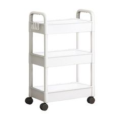 a white plastic utility cart on wheels with two shelves and one shelf attached to it