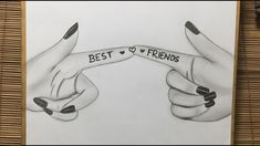 two hands with black and white nail polish holding the words best friends