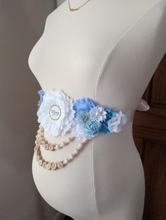 "Celebrate your baby's arrival with our maternity flower sash. Use our baby bump sash to jazz up your pregnancy outfit at your baby shower and maternity photo session. You can also reveal the gender of your new baby in a subtle and elegant way with the pregnancy flower sash. If you are looking for a gift for the mom-to-be, this pregnancy sash is an ideal keepsake and gift for expectant mothers to remember her pregnancy journey. Not only she gets to enjoy it while pregnant, she can also reuse it Baby Shower Sash For Mom, Pregnant Tummy, Custom Baby Items, Boho Baby Boy, Baby Boy Sprinkle, Pregnancy Outfit, Mom Belly, Maternity Photo Props