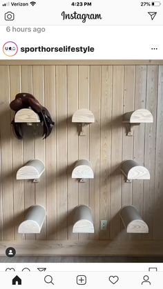 an instagram page with several hats hanging on the wall