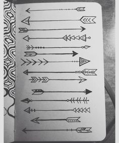 an open notebook with arrows drawn on it