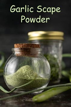 two glass jars filled with green powder next to each other