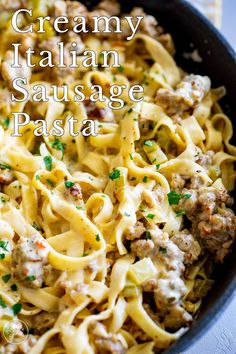 creamy italian sausage pasta in a skillet