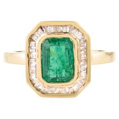 Art Deco Emerald Diamond Halo Wedding Ring in 18K Gold featuring natural emerald of 0.98 carats and diamonds of 0.25 carats. The gorgeous handcrafted ring goes with every style. Emerald enhances intellectual capacity of the person. Designed with octagon cut emerald set with halo diamonds that makes it a perfect fit to wear it on your wedding or style it with any of your basic outfit to give it a glam. This is a perfect Emerald Wedding Ring. This is a perfect May Birthstone Jewelry also perfect Grandma Gift, Valentine Gift, Gift For Mom, Wedding Gift, Engagement Gift, Mother Daughter Gift, Bride To Be Gift, Bridesmaid Gift, Gift for Wife, Mom Gift, Best Friend Gift, Anniversary Present, Wife Gift, Girlfriend Gift or any Holiday Gift for Mother, Sister, Daughter, Grandma, Fiancé, Girlfriend, Baguette Halo, Modern Wedding Rings, Art Deco Emerald, Emerald Set, Halo Wedding Ring, Emerald Wedding Rings, Statement Rings Diamond, Wedding Ring For Her, Emerald Ring Gold