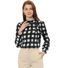 As a classy and elegant appeal, this bow tie-neck shirt will always be timeless. This elegant blouse comes in a classic style featuring a bow-tie neck, long sleeves, and vintage check prints that make your figure look polished! This blouse would make you charming and flattering, featuring a classy tie-bow that makes you special in the office. This office blouse is suitable for spring, summer, autumn, casual outings, office, work, leisure, formal, and daily wear. Chic Long Sleeve Shirt With Bow, Classic Tie Neck Top With Bow, Elegant Fall Blouse With Bow Tie, Classic Tops With Bow For Work, Classic Bow Tops For Workwear, Classic Long Sleeve Blouse With Bow, Classic Workwear Tops With Bow Detail, Classic Workwear Tops With Bow, Elegant Bow Tie Blouse For Work