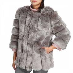 Stay warm with this faux fur coat Faux fur all over Colour: grey Composition: 85% modacrylic/15% acrylic Care: dry clean only One size only represents size 8-12 UK