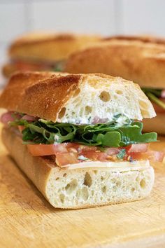 a close up of a sandwich on a cutting board