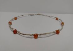 "DETAILS -Gemstone- Carnelian -Bead size- 6mm -Bead shape- round -Material- hemp -Length- 15\" If you need a different length feel free to message me:) *With all of my designs I strive for high quality and pay close attention to detail. *Great for casual occasions or going out, also great for a gift for your wife, sister, best friend, etc *Be kind to your hemp jewelry! Care instructions to ensure a longer lasting piece! - Remove your jewelry before sleeping.  - Do not bathe or swim while wearing, water will weaken the fibers and reduce durability. - Perfumes, essential oils, lotion and cleaning products will break down the hemp faster.  - Store in a cool dry place out of direct sunlight. *Feel free to contact me with any questions! If you are unhappy with the product, send it back and I wi Adjustable Natural Color Necklaces With Round Beads, Adjustable Natural Color Beaded Necklaces With Round Beads, Adjustable Natural Round Beads Necklaces, Hand-strung Adjustable Natural Necklace, Adjustable Natural Beaded Necklaces, Adjustable Natural Round Beaded Necklaces, Spiritual Adjustable Natural Jewelry, Adjustable Hand-strung Choker As Gift, Casual Handmade Round Necklace